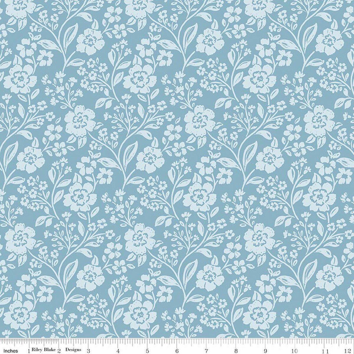 Image of Sweet Cotton Tales Trailing Blossoms Blue quilting cotton fabric by Cayla Naylor for Riley Blake Designs. Features flowers on a blue background. Cute Little Fabric Shop