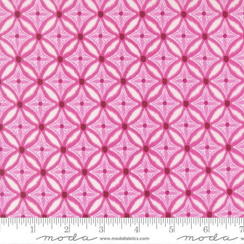 Image of Reef Medallion Magenta quilting cotton fabric by Kate Spain for Moda Fabrics. Features geometric design on a pink background. Cute Little Fabric Shop