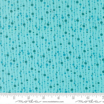 Image of Reef Bubbles Surf quilting cotton fabric by Kate Spain for Moda Fabrics. Features bubbles on a blue background. Cute Little Fabric Shop
