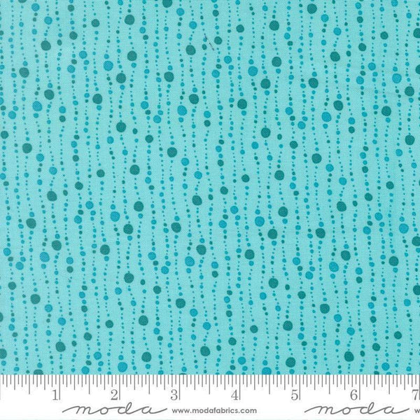Image of Reef Bubbles Surf quilting cotton fabric by Kate Spain for Moda Fabrics. Features bubbles on a blue background. Cute Little Fabric Shop