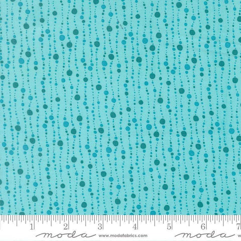 Image of Reef Bubbles Surf quilting cotton fabric by Kate Spain for Moda Fabrics. Features bubbles on a blue background. Cute Little Fabric Shop