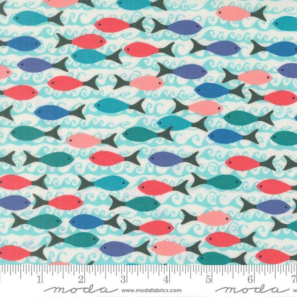 Image of Reef School of Fish Pearl quilting cotton fabric by Kate Spain for Moda Fabrics. Features fish on a blue background. Cute Little Fabric Shop