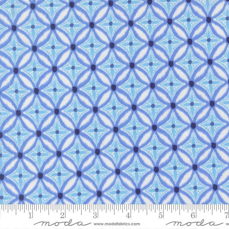 Image of Reef Medallion Swordfish quilting cotton fabric by Kate Spain for Moda Fabrics. Features geometric pattern on a blue background. Cute Little Fabric Shop