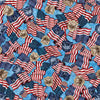 Image of 1776 American Flag & 250 Crest Blue quilting cotton fabric by Morris Creative Group for QT Fabrics. Features flags on a blue background. Cute Little Fabric Shop