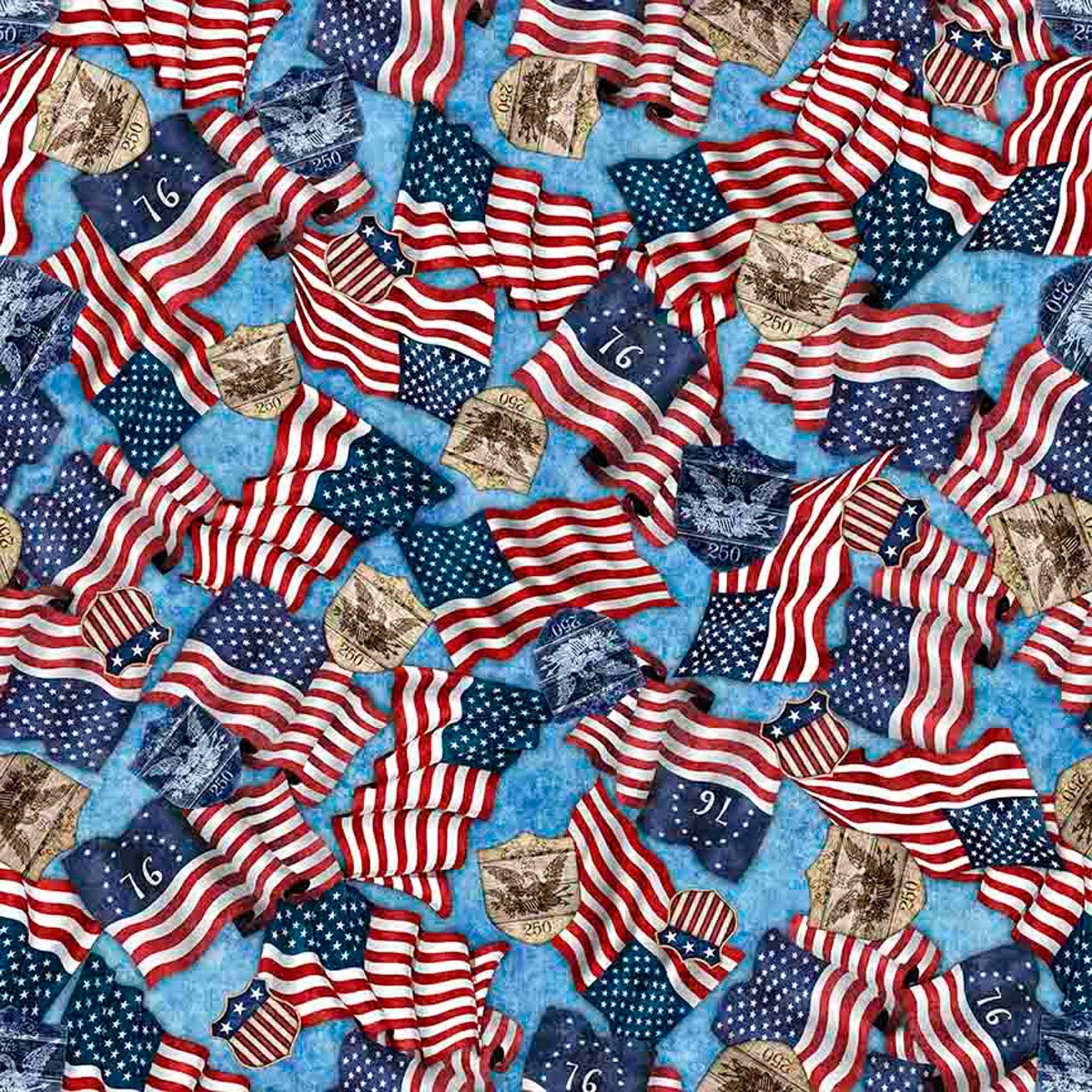 Image of 1776 American Flag & 250 Crest Blue quilting cotton fabric by Morris Creative Group for QT Fabrics. Features flags on a blue background. Cute Little Fabric Shop