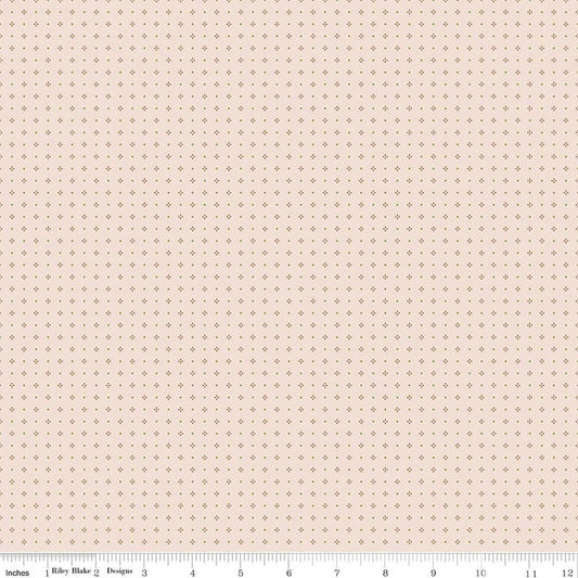 Image of Farmer's Daughter Calico Background Maple quilting cotton fabric by Lori Holt for Riley Blake Designs. Features dots on a cream background. Cute Little Fabric Shop