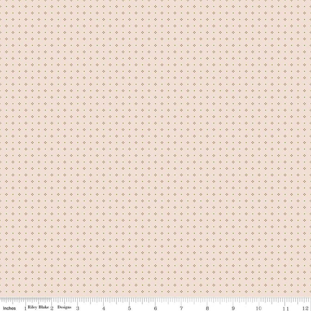 Image of Farmer's Daughter Calico Background Maple quilting cotton fabric by Lori Holt for Riley Blake Designs. Features dots on a cream background. Cute Little Fabric Shop