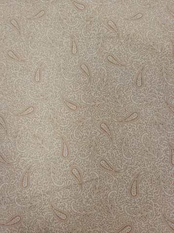 a repeating pattern of paisley designs in various shades of brown and beige.