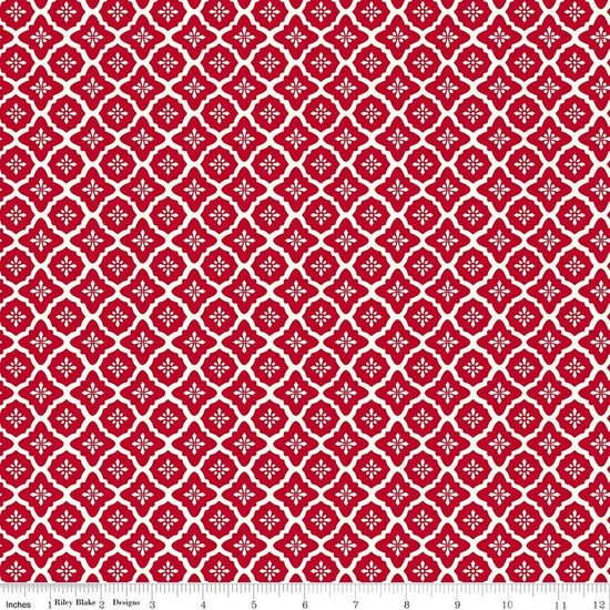 Image of Radiant Ruby Moroccan Schoolhouse quilting cotton fabric by Dani Mogstad for Riley Blake Designs. Features medallions on a red background. Cute Little Fabric Shop
