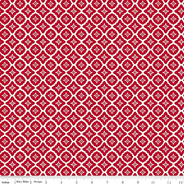 Image of Radiant Ruby Moroccan Schoolhouse quilting cotton fabric by Dani Mogstad for Riley Blake Designs. Features medallions on a red background. Cute Little Fabric Shop