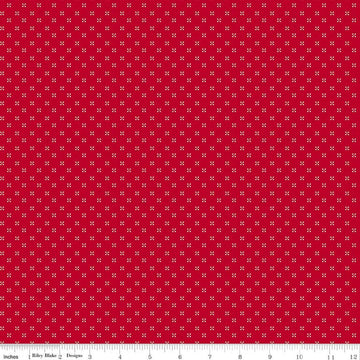 Image of Radiant Ruby Dots Schoolhouse quilting cotton fabric by Dani Mogstad for Riley Blake Designs. Features dots on a red background. Cute Little Fabric Shop