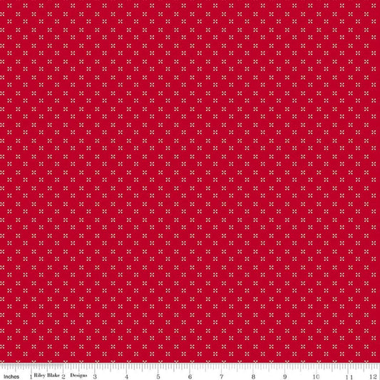 Image of Radiant Ruby Dots Schoolhouse quilting cotton fabric by Dani Mogstad for Riley Blake Designs. Features dots on a red background. Cute Little Fabric Shop