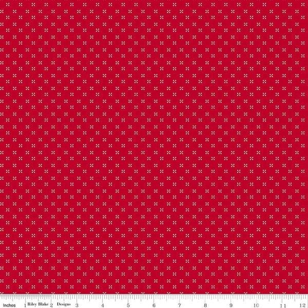 Image of Radiant Ruby Dots Schoolhouse quilting cotton fabric by Dani Mogstad for Riley Blake Designs. Features dots on a red background. Cute Little Fabric Shop
