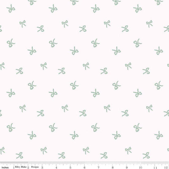 Image of Sweet Cotton Tales Twirls & Ties Cream quilting cotton fabric by Cayla Naylor for Riley Blake Designs. Features bows on a white background. Cute Little Fabric Shop