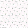 Image of Sweet Cotton Tales Twirls & Ties Cream quilting cotton fabric by Cayla Naylor for Riley Blake Designs. Features bows on a white background. Cute Little Fabric Shop