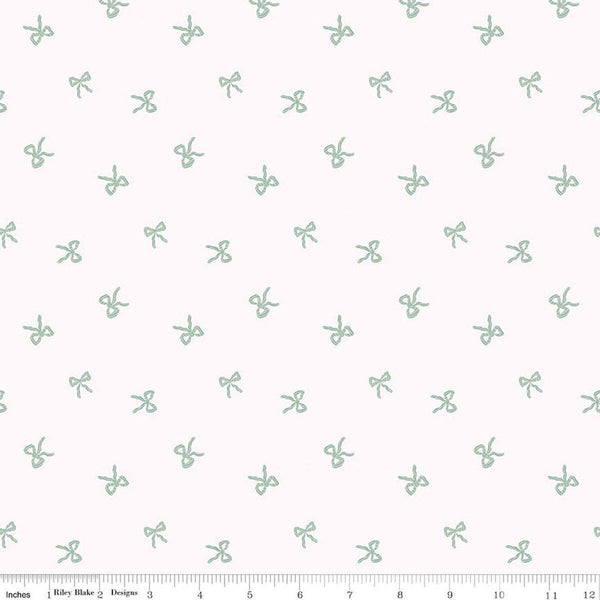 Image of Sweet Cotton Tales Twirls & Ties Cream quilting cotton fabric by Cayla Naylor for Riley Blake Designs. Features bows on a white background. Cute Little Fabric Shop