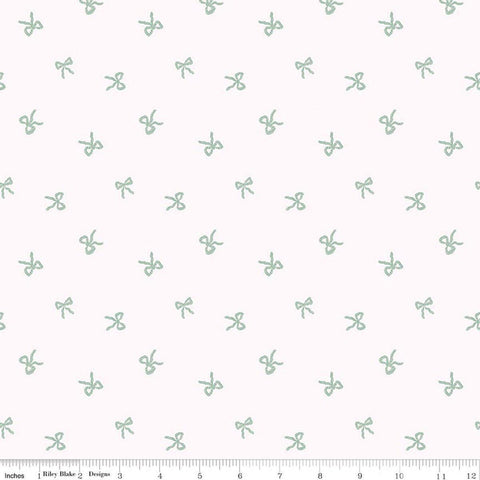 Image of Sweet Cotton Tales Twirls & Ties Cream quilting cotton fabric by Cayla Naylor for Riley Blake Designs. Features bows on a white background. Cute Little Fabric Shop