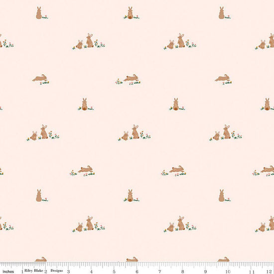 Image of Sweet Cotton Tales Flopsy Fields Blush quilting cotton fabric by Cayla Naylor for Riley Blake Designs. Features rabbits on a cream background. Cute Little Fabric Shop