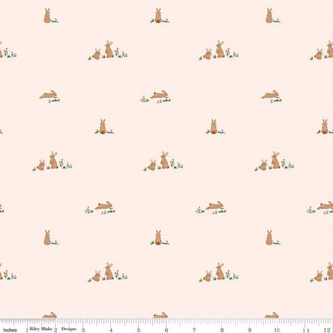 Image of Sweet Cotton Tales Flopsy Fields Blush quilting cotton fabric by Cayla Naylor for Riley Blake Designs. Features rabbits on a cream background. Cute Little Fabric Shop