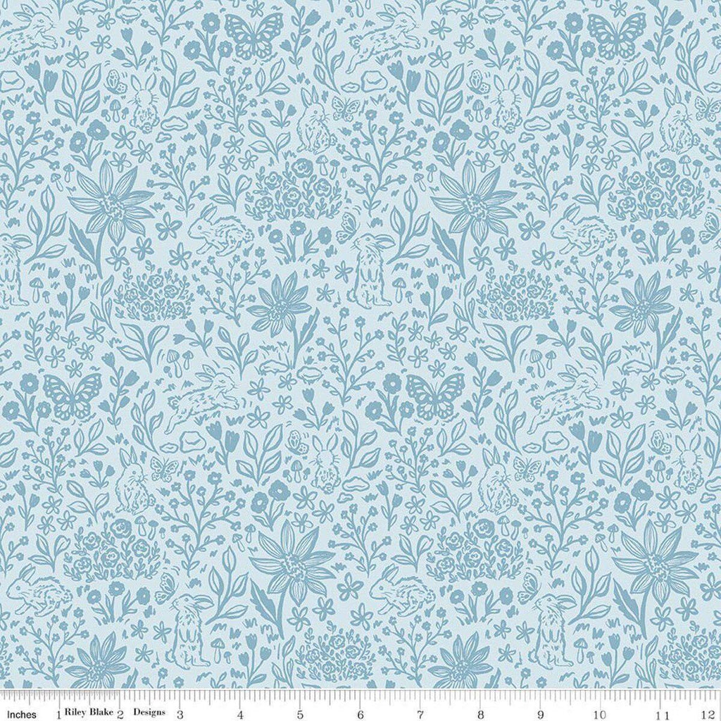 Image of Sweet Cotton Tales Bunny Meadows Powder quilting cotton fabric by Cayla Naylor for Riley Blake Designs. Features plants on a blue background. Cute Little Fabric Shop