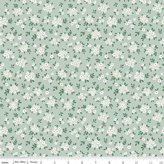 Image of Sweet Cotton Tales Blooming Bliss Sage quilting cotton fabric by Cayla Naylor for Riley Blake Designs. Features flowers on a green background. Cute Little Fabric Shop