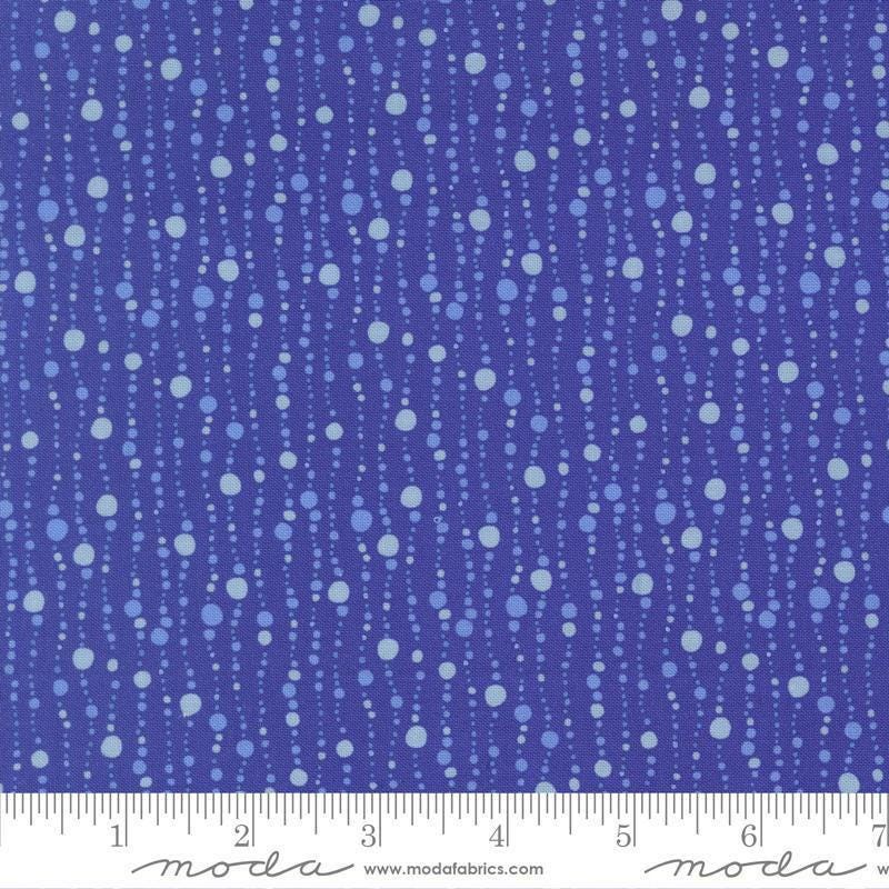 Image of Reef Bubbles Ocean quilting cotton fabric by Kate Spain for Moda Fabrics. Features bubbles on a blue background. Cute Little Fabric Shop