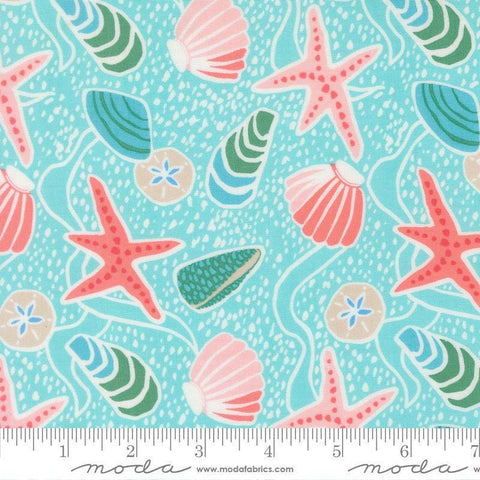 Image of Reef Sea Shells Surf quilting cotton fabric by Kate Spain for Moda Fabrics. Features shells on a blue background. Cute Little Fabric Shop