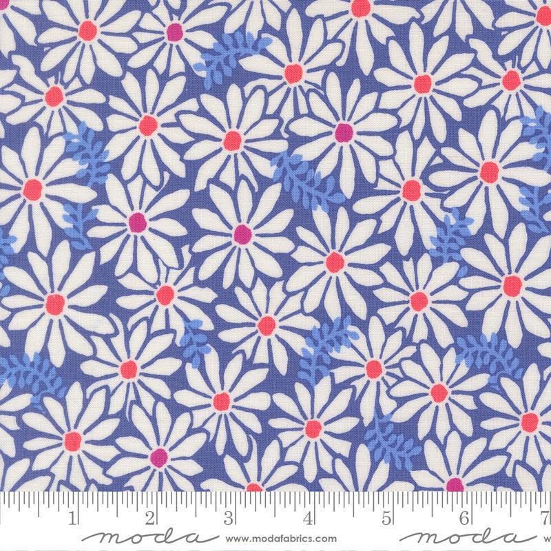Image of Reef Bloom Blue Whale quilting cotton fabric by Kate Spain for Moda Fabrics. Features flowers on a blue background. Cute Little Fabric Shop