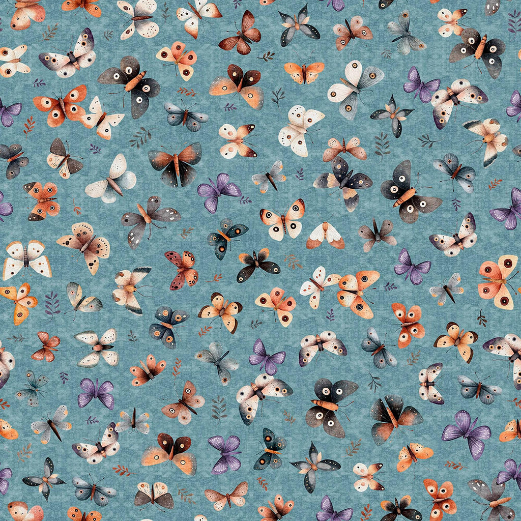 Image of Night Owls Moths Dusty Teal quilting cotton by Morris Creative Group for QT Fabrics. Features moths on a blue background. Cute Little Fabric Shop