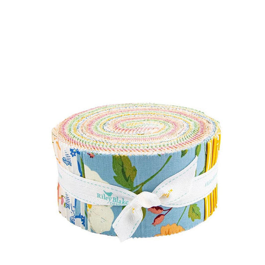 A roll of colorful fabric with a floral pattern and a white ribbon tied around it.