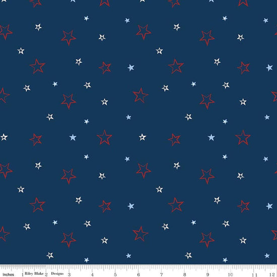 Image of American Honor Stars Blue quilting cotton fabric by Vicki Gifford for Riley Blake Designs. Features stars on a blue background. Cute Little Fabric Shop