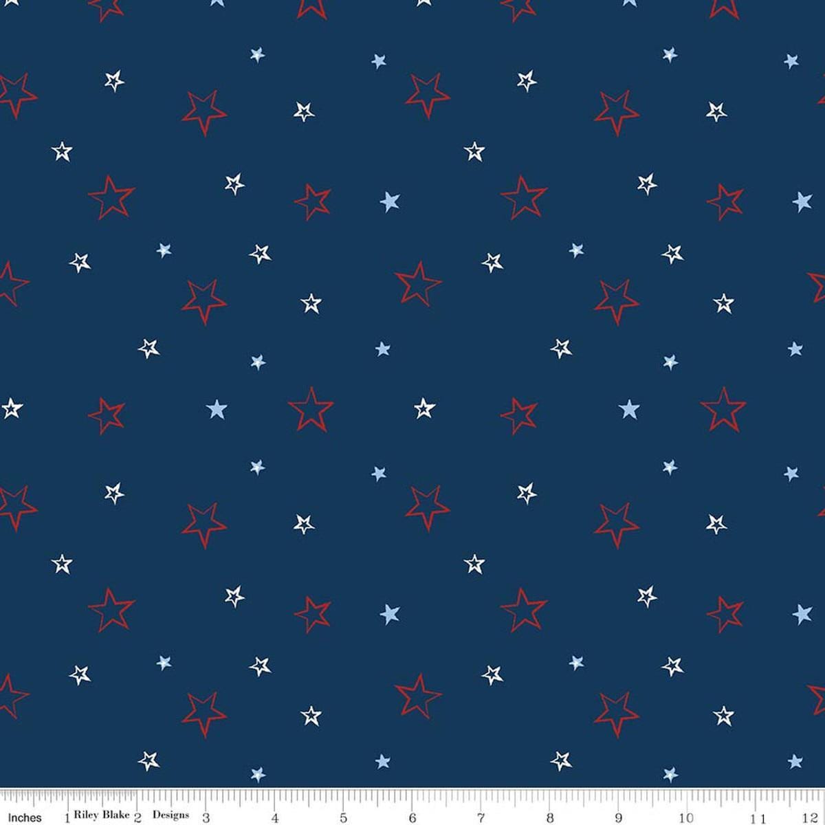Image of American Honor Stars Blue quilting cotton fabric by Vicki Gifford for Riley Blake Designs. Features stars on a blue background. Cute Little Fabric Shop