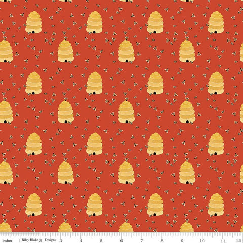 Image of Utah Beehives Orange quilting cotton fabric by Kelsey Carlson for Riley Blake Designs. Features beehives on an orange background. Cute Little Fabric Shop