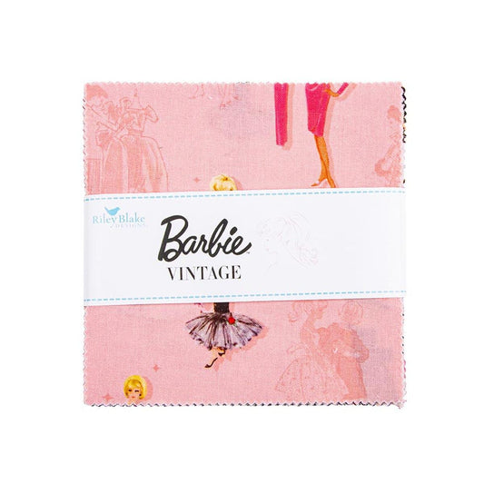 The image is a pink fabric with a printed design of a woman in a pink dress and a man in a pink suit.