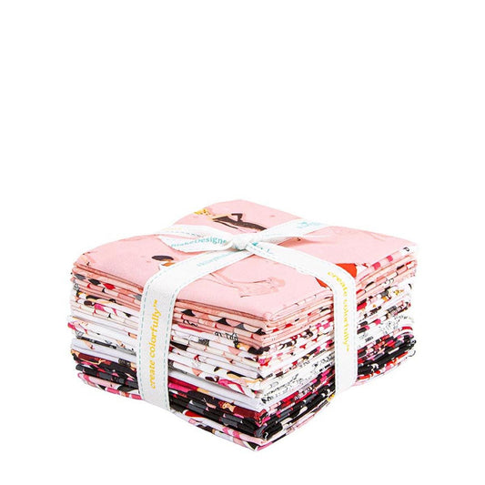 A bundle of colorful fabric squares tied together with a white ribbon.