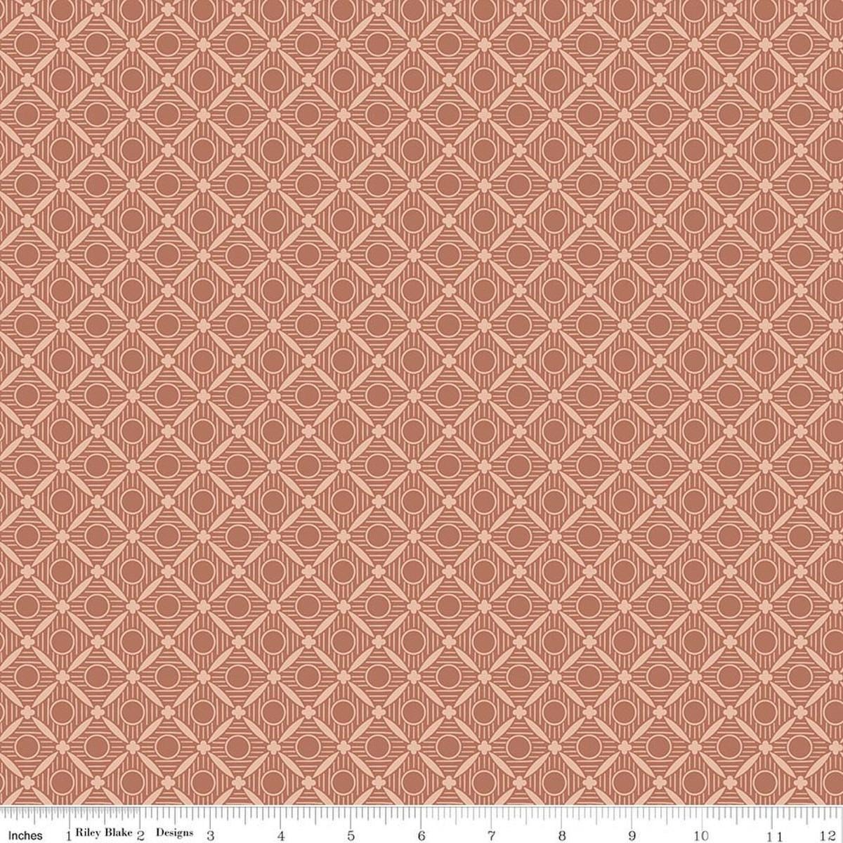 Image of Ambleside Peels Dusty Rose quilting cotton fabric by Amanda Niederhauser for Riley Blake Designs. Features a geometric design on an orange background. Cute Little Fabric Shop