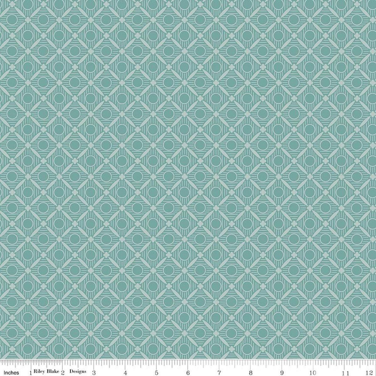 Image of Ambleside Peels Blue quilting cotton fabric by Amanda Niederhauser for Riley Blake Designs. Features a geometric design on a blue background. Cute Little Fabric Shop