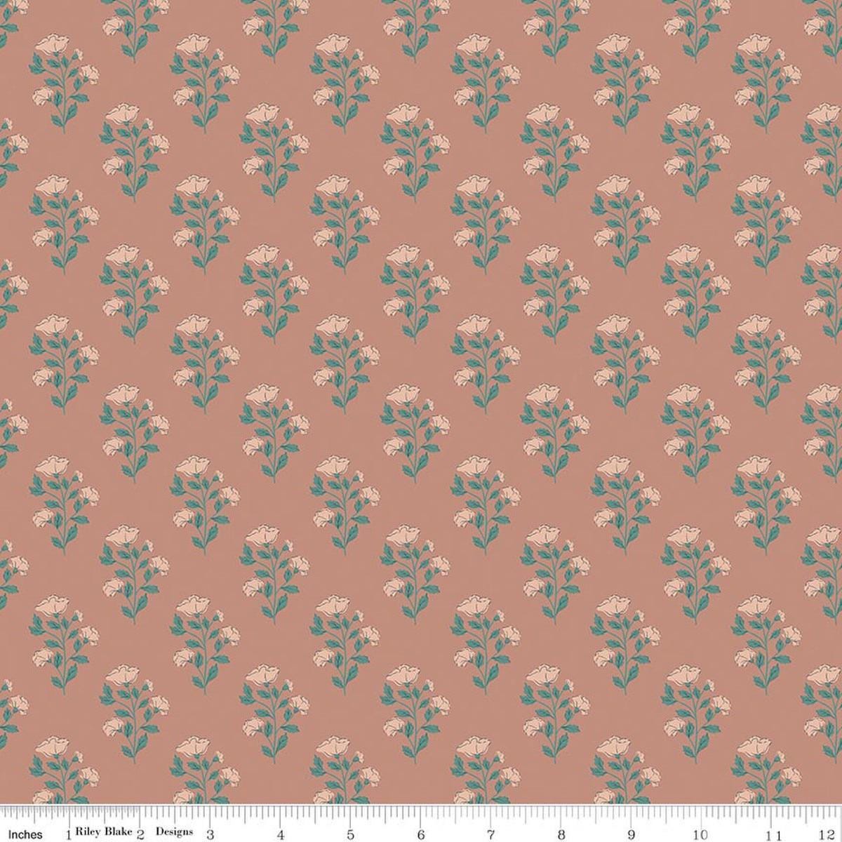 Image of Ambleside Flower Toss Dusty Rose quilting cotton fabric by Amanda Niederhauser for Riley Blake Designs. Features flowers on an orange background. Cute Little Fabric Shop