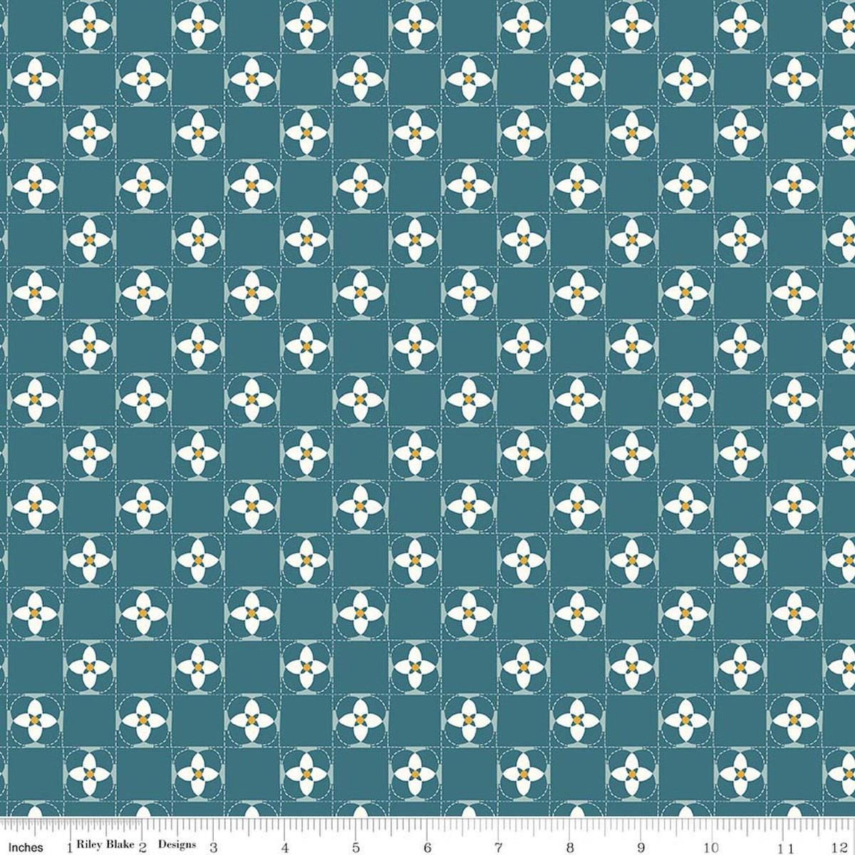 Image of Utah Quilt Squares Blue quilting cotton fabric by Kelsey Carlson for Riley Blake Designs. Features floral blocks on a blue background. Cute Little Fabric Shop