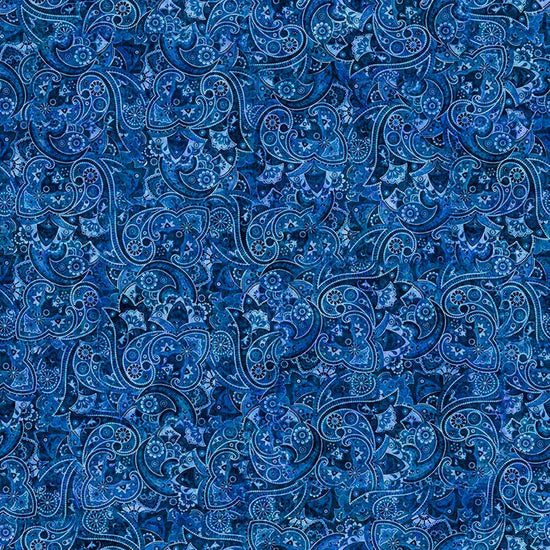 Image of Yippie Ki Yay! Bandana Paisley Denim quilting cotton fabric by Morris Creative Group for QT Fabrics. Features paisley on a blue background. Cute Little Fabric Shop.