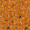 Image of Yippie Ki Yay! Cowboy/Cowgirl Toss Pumpkin quilting cotton fabric by Morris Creative Group for QT Fabrics. Features cowboys on an orange background. Cute Little Fabric Shop.