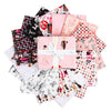 a collection of various fabric pieces with different patterns and designs, including a pink fabric with a bow and a white fabric with a black and white pattern.