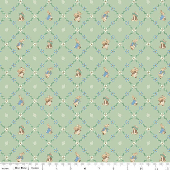 Image of Peter Rabbit and Benjamin Bunny Lattice Green licensed quilting cotton fabric by the RBD Designers for Riley Blake Designs. Features lattice on a green background. Cute Little Fabric Shop