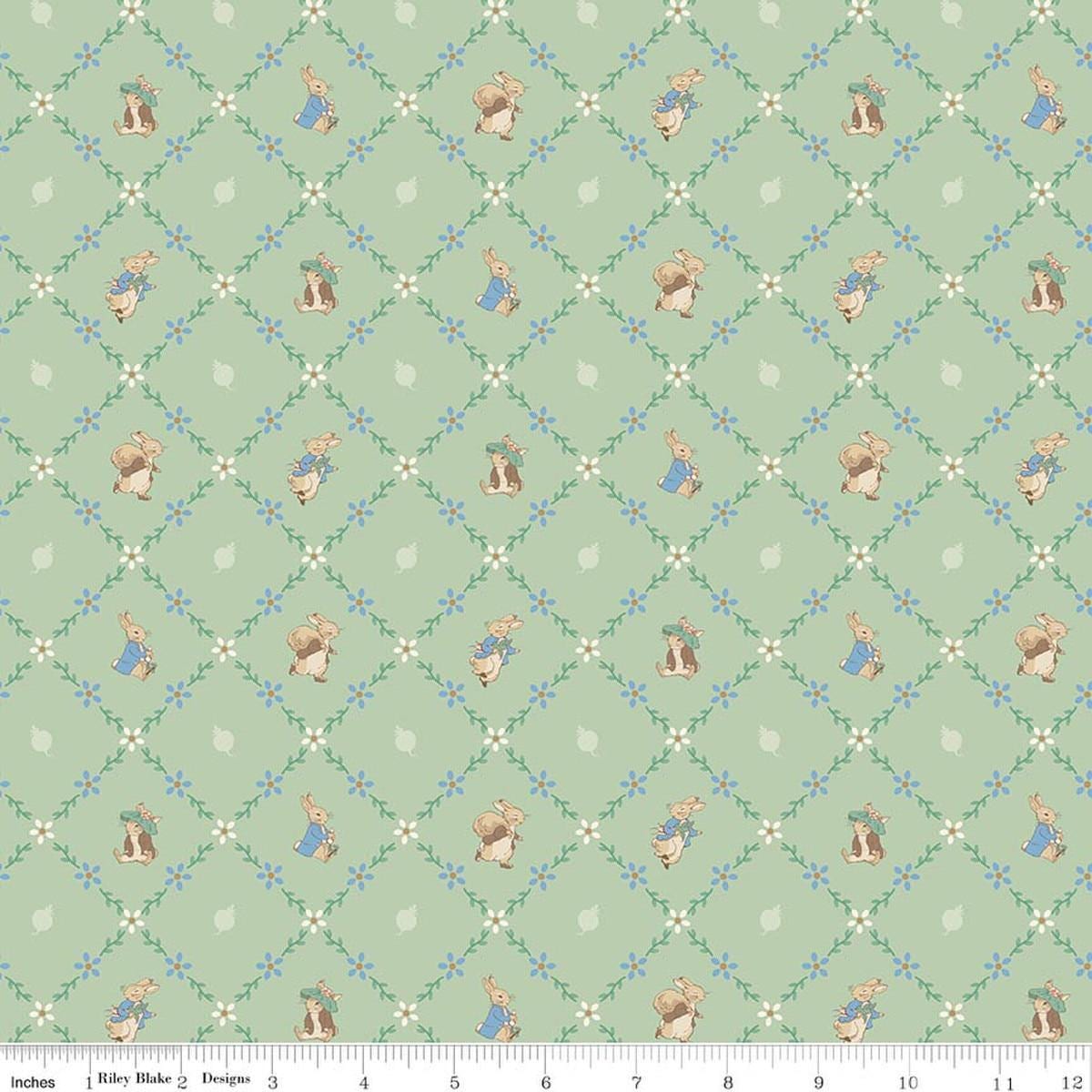 Image of Peter Rabbit and Benjamin Bunny Lattice Green licensed quilting cotton fabric by the RBD Designers for Riley Blake Designs. Features lattice on a green background. Cute Little Fabric Shop