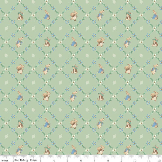 Image of Peter Rabbit and Benjamin Bunny Lattice Green licensed quilting cotton fabric by the RBD Designers for Riley Blake Designs. Features lattice on a green background. Cute Little Fabric Shop