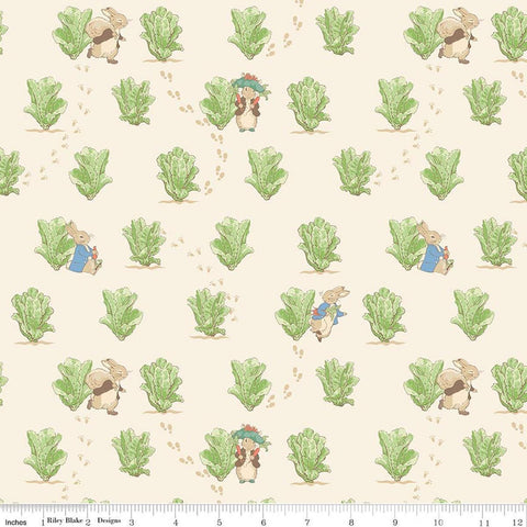 Image of Peter Rabbit and Benjamin Bunny Lettuce Patch Cream licensed quilting cotton fabric by the RBD Designers for Riley Blake Designs. Features lettuce on a cream background. Cute Little Fabric Shop