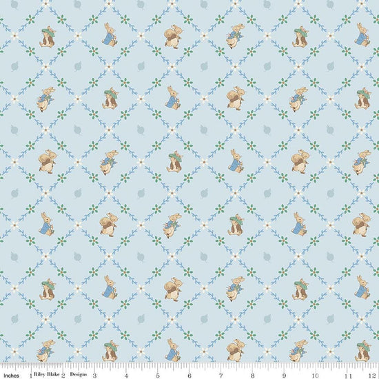 Image of Peter Rabbit and Benjamin Bunny Lattice Blue licensed quilting cotton fabric by the RBD Designers for Riley Blake Designs. Features lattice on a blue background. Cute Little Fabric Shop
