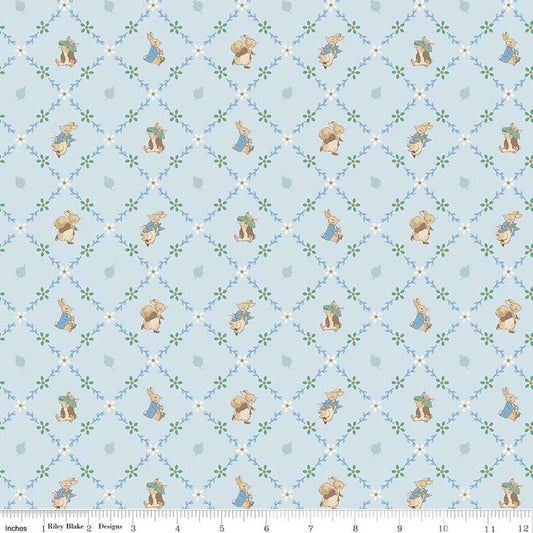 Image of Peter Rabbit and Benjamin Bunny Lattice Blue licensed quilting cotton fabric by the RBD Designers for Riley Blake Designs. Features lattice on a blue background. Cute Little Fabric Shop