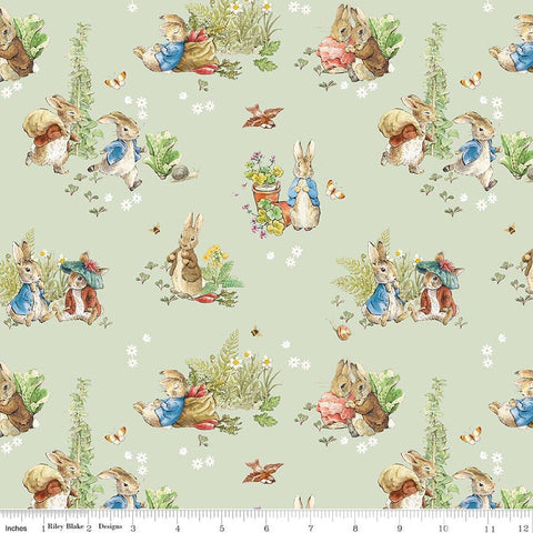 Image of Peter Rabbit and Benjamin Bunny Main Green licensed quilting cotton fabric by the RBD Designers for Riley Blake Designs. Features rabbits on a green background. Cute Little Fabric Shop