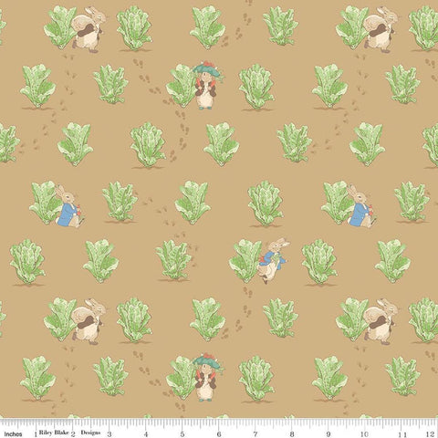 Image of Peter Rabbit and Benjamin Bunny Lettuce Patch Tan licensed quilting cotton fabric by the RBD Designers for Riley Blake Designs. Features lettuce on a brown background. Cute Little Fabric Shop